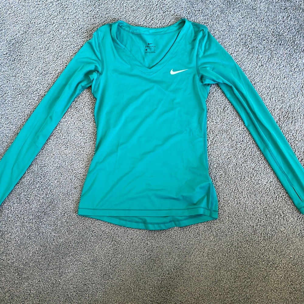 Green Nike athletic shirt